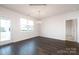 Dining room with sleek hardwood flooring and abundant natural light, perfect for gatherings at 5231 Reedy Ridge Rd, Charlotte, NC 28215
