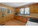 Functional kitchen with a stainless steel sink and wood cabinets at 602 Dallas Spencer Mountain Rd, Dallas, NC 28034