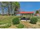Backyard patio and seating area offer an ideal space for relaxation and gatherings at 602 Dallas Spencer Mountain Rd, Dallas, NC 28034