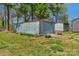Exterior shot of a garage and shed providing ample outdoor storage space at 602 Dallas Spencer Mountain Rd, Dallas, NC 28034