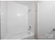 Bathroom shower features white subway tile at 6142 Meadow Rose Ln, Charlotte, NC 28215