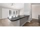Kitchen featuring breakfast bar which is great for entertaining Gathering and friends at 6142 Meadow Rose Ln, Charlotte, NC 28215