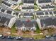 Aerial view of the townhome showcasing its location within a well-maintained community at 6936 Colonial Garden Dr, Huntersville, NC 28078