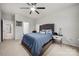 Relaxing bedroom with a large bed, ceiling fan, and a calm, inviting atmosphere at 6936 Colonial Garden Dr, Huntersville, NC 28078