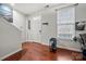 Welcoming foyer featuring hardwood floors and ample natural light, creating an inviting entrance at 6936 Colonial Garden Dr, Huntersville, NC 28078
