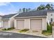 Detached garages with ample parking space at 6936 Colonial Garden Dr, Huntersville, NC 28078