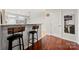 Charming kitchen with bar top and hardwood flooring at 6936 Colonial Garden Dr, Huntersville, NC 28078