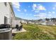 Cozy backyard patio with grill and outdoor seating, perfect for entertaining guests at 7217 Somerford Rd, Charlotte, NC 28215