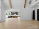 Open floorplan with kitchen, living room and wooden beam architecture at 733 Barbary Pl, Lincolnton, NC 28092