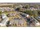 Aerial view of a neighborhood featuring lush trees and winding roads at 7364 Laurel Valley Rd, Charlotte, NC 28273