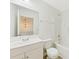 Bathroom with vanity, large mirror, neutral color palette, light fixtures, and bath/shower combo at 7364 Laurel Valley Rd, Charlotte, NC 28273