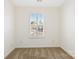 Bright bedroom features neutral carpet, white trim, plantation shutters, and ample natural light at 7364 Laurel Valley Rd, Charlotte, NC 28273