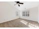 Bedroom with carpet, a ceiling fan, and natural light from the windows at 7364 Laurel Valley Rd, Charlotte, NC 28273