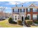 Attractive exterior of the townhome with a well manicured lawn at 7364 Laurel Valley Rd, Charlotte, NC 28273