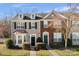 Charming townhomes featuring traditional architecture and well-maintained landscaping at 7364 Laurel Valley Rd, Charlotte, NC 28273