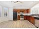 Spacious kitchen featuring stainless steel appliances and wooden cabinets at 7364 Laurel Valley Rd, Charlotte, NC 28273