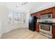 Bright kitchen boasts a breakfast nook with large bay window and stainless steel appliances at 7364 Laurel Valley Rd, Charlotte, NC 28273