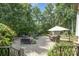 Charming backyard patio with comfortable seating, dining set, and lush greenery, perfect for outdoor enjoyment at 7913 Buena Vista Dr, Denver, NC 28037