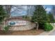 A beautifully designed stone entrance sign welcomes residents and guests into this established and well-maintained community at 824 Wynnshire Dr # D, Hickory, NC 28601