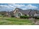 Charming home exterior with stone accents, lush landscaping, and a well-manicured lawn at 824 Wynnshire Dr # D, Hickory, NC 28601