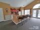 Kitchenette area with a refrigerator, microwave, sink and seating at the bar at 824 Wynnshire Dr # D, Hickory, NC 28601