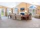 Bright and airy living area featuring a fireplace, large windows, and ample seating space at 824 Wynnshire Dr # D, Hickory, NC 28601
