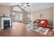 Cozy living room with fireplace, vaulted ceilings, and wood floors, creating a warm and inviting space at 824 Wynnshire Dr # D, Hickory, NC 28601