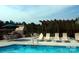 Community pool area featuring a cabana with a grill and dining area at 824 Wynnshire Dr # D, Hickory, NC 28601