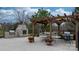 Pergola featuring a stone fireplace, multiple seating areas, and barbecue at 824 Wynnshire Dr # D, Hickory, NC 28601