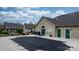 Community clubhouse and pool with a safety cover stretched over the water in this lovely neighborhood at 824 Wynnshire Dr # D, Hickory, NC 28601