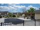 View of the community pool area showcasing pergola, stone fireplace, and barbecue at 824 Wynnshire Dr # D, Hickory, NC 28601