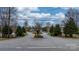 A street view captures the well-maintained intersection adorned with landscaped medians, reflecting a tranquil and inviting neighborhood at 824 Wynnshire Dr # D, Hickory, NC 28601