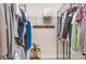Well-organized walk-in closet with metal shelving and hanging rods for ample storage space at 9534 Liberty Hill Dr # 196, Mint Hill, NC 28227