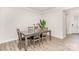 Cozy dining area with a simple table setting, light walls, and natural light, perfect for intimate meals at 9534 Liberty Hill Dr # 196, Mint Hill, NC 28227