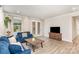 Inviting living room featuring comfortable seating, neutral walls, and ample natural light, creating a relaxing and cozy space at 9534 Liberty Hill Dr # 196, Mint Hill, NC 28227