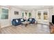Bright living room with modern furniture, large windows, and elegant curtains, creating a welcoming and comfortable atmosphere at 9534 Liberty Hill Dr # 196, Mint Hill, NC 28227