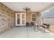 Covered brick patio with ceiling fan and furniture to enjoy the outdoors at 9534 Liberty Hill Dr # 196, Mint Hill, NC 28227