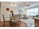 Bright living space offering hardwood floors, lots of light, neutral paint, and modern furnishings at 1000 E Woodlawn Rd # 110, Charlotte, NC 28209
