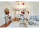 Bright living room featuring an open floor plan, hardwood floors and tasteful furniture at 1000 E Woodlawn Rd # 110, Charlotte, NC 28209