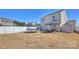 Large yard with white fence, patio, gazebo with seating, and a trampoline at 1008 Newton Ave, Rock Hill, SC 29732