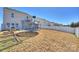 Large backyard with garden beds, trampoline, and patio seating at 1008 Newton Ave, Rock Hill, SC 29732