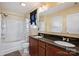 Bathroom highlighting double sink vanity with granite counters and well-lit mirrors creating a functional space at 1008 Newton Ave, Rock Hill, SC 29732