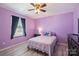 Bedroom featuring ceiling fan, natural light, and hardwood floors, creating a comfortable and stylish space at 1008 Newton Ave, Rock Hill, SC 29732