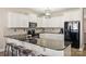 Modern kitchen with white cabinetry, black countertops and stainless steel appliances at 1008 Newton Ave, Rock Hill, SC 29732