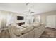 Spacious living room features modern flooring, ceiling fan, and natural light at 1008 Newton Ave, Rock Hill, SC 29732