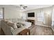 Spacious living room features modern flooring, ceiling fan, and natural light at 1008 Newton Ave, Rock Hill, SC 29732