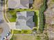 Aerial view of a home showcasing its roof, lawn, driveway, and surrounding neighborhood at 1016 Filly Dr, Indian Trail, NC 28079