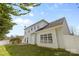Exterior of a two-story home with a well-maintained lawn, concrete patio, and vinyl siding at 1016 Filly Dr, Indian Trail, NC 28079