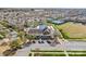 Aerial shot of a community center with pool, tennis courts, and surrounding residential area at 1016 Filly Dr, Indian Trail, NC 28079