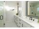 Bright main bathroom featuring marble floors, quartz counters and a glass walk-in shower at 106 Isle Of Pines Rd, Mooresville, NC 28117